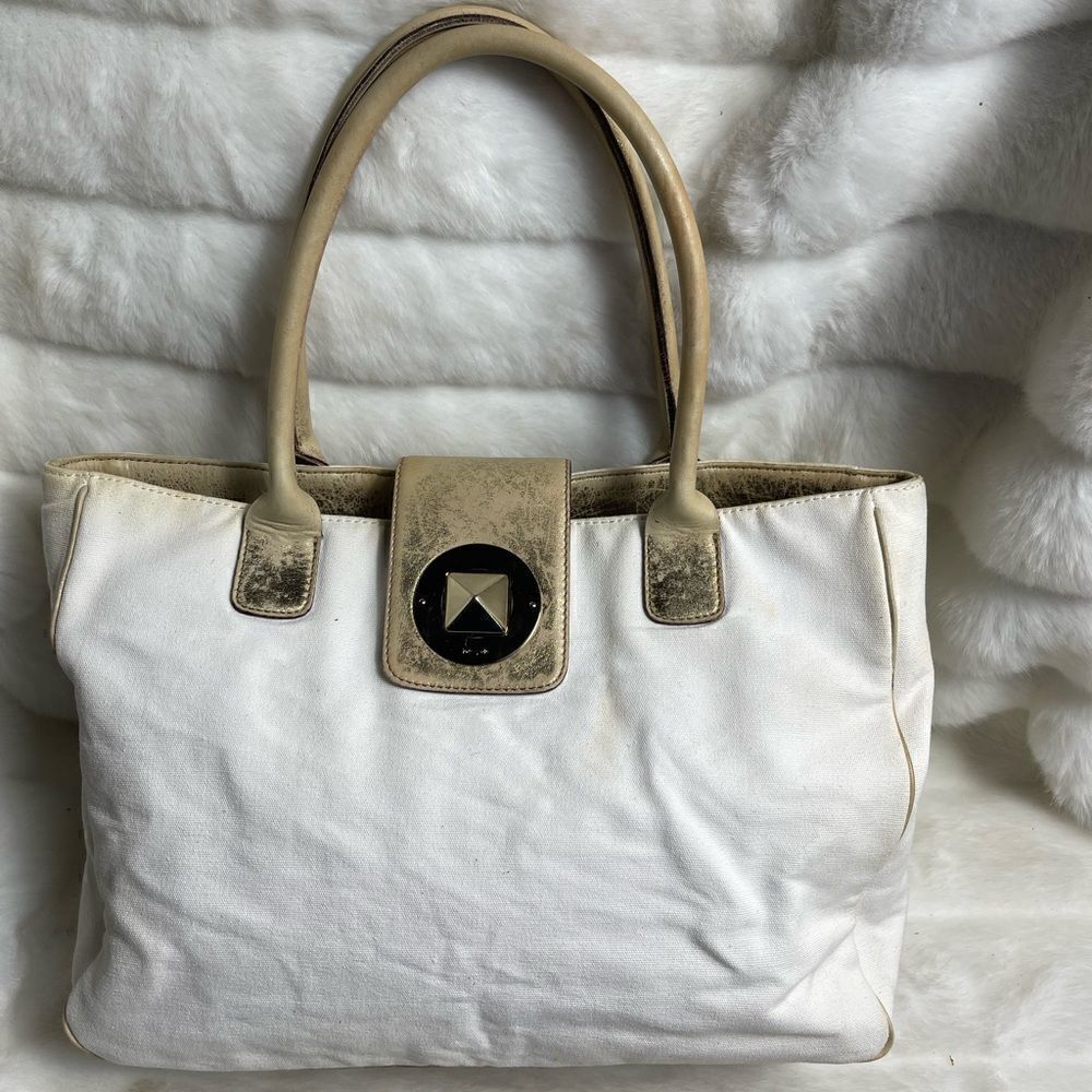 Vintage Kate spade beige canvas and faded gold trims shoulder bag.